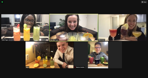 5 people on a zoom call each showing colourful cocktails they've made.