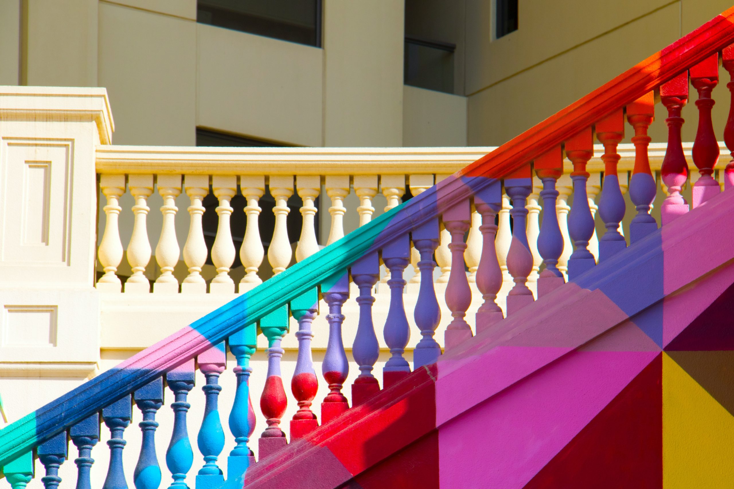 A colourfully painted staircase inside a building.